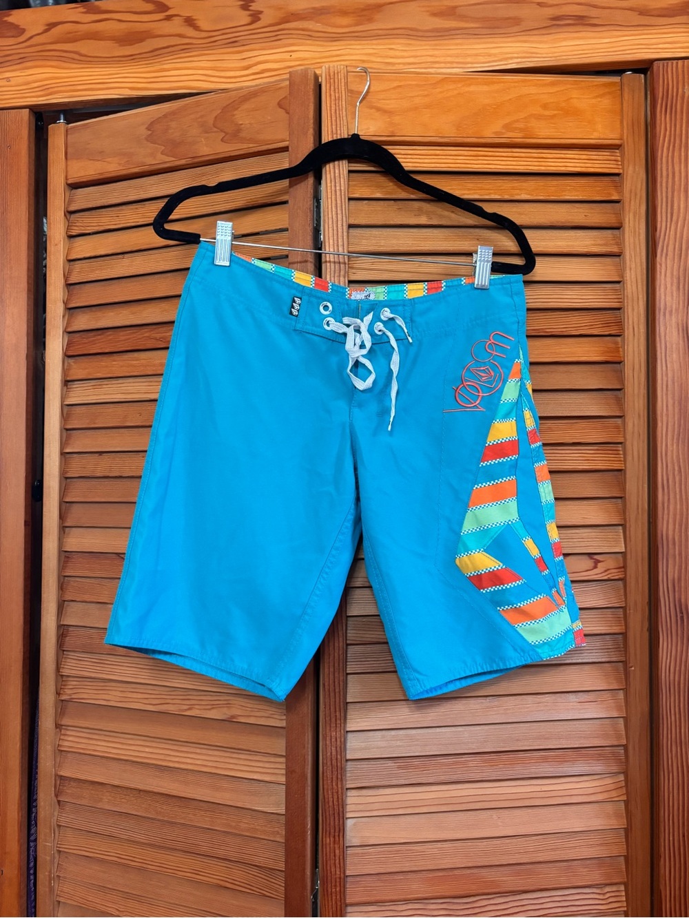 Volcom Teal Blue women’s Swim Boardshorts with Multicolor Stripe Panel